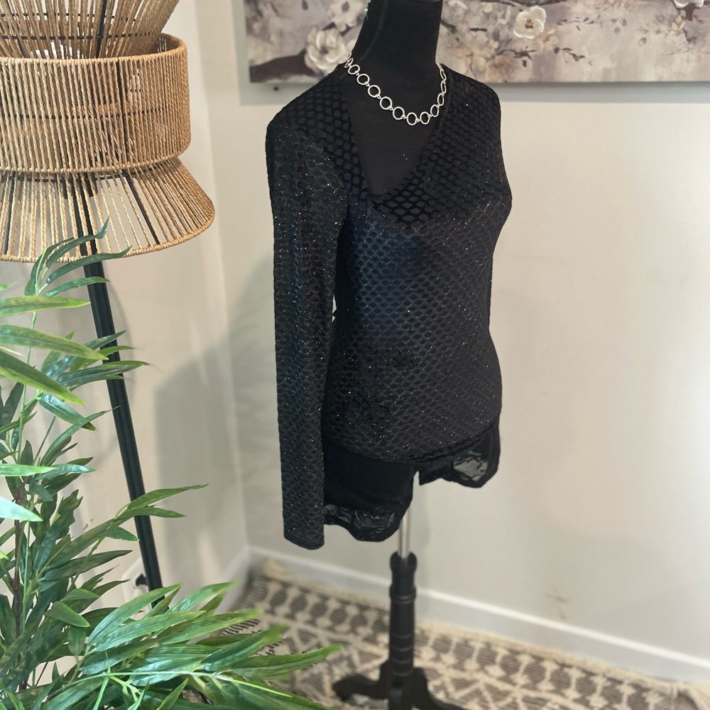NWT 🖤 women bodysuit in a size M